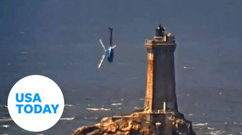 Helicopter loses control dangerously close to lighthouse, rough waves | USA TODAY