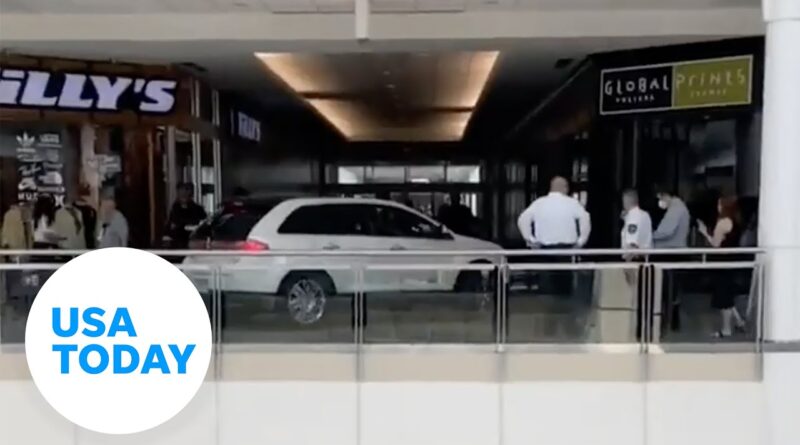 Elderly woman drives car onto second floor of mall, escorted out | USA TODAY